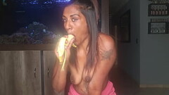 Topless desi squeezes her boobs as she sucks and deepthroats on a banana Thumb